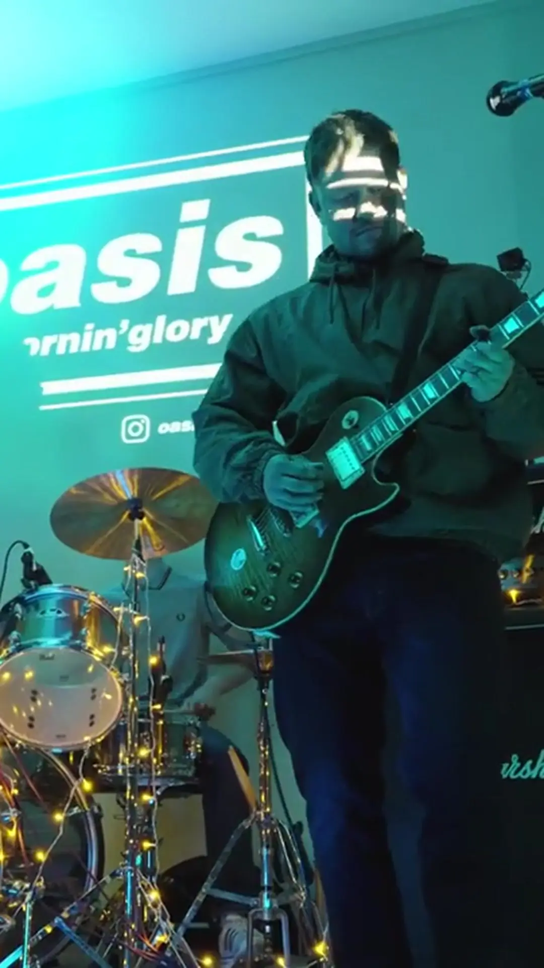 Lead guitarist full length during Some Might Say